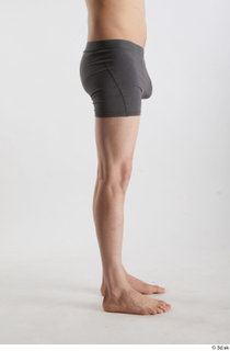 Brett  1 flexing leg side view underwear 0001.jpg